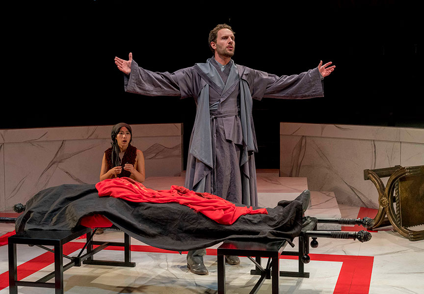 Wenona Truong as Servant to Octavius and Jared Van Heel as Mark Antony in The Old Globe and University of San Diego Shiley Graduate Theatre Program presentation of Shakespeare’s Julius Caesar, directed by Allegra Libonati, October 20–28, 2018 at The Old Globe. Photo by Daren Scott.