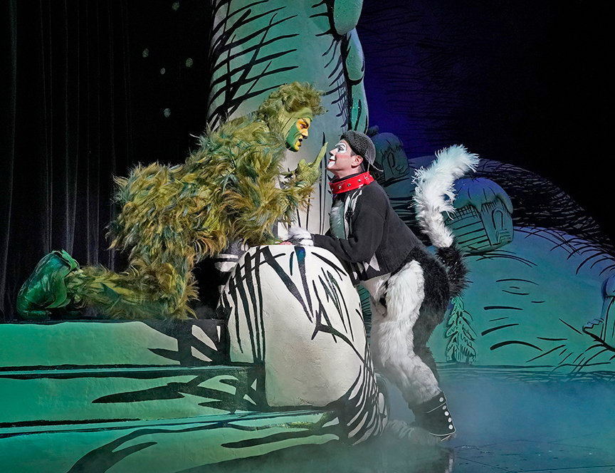 (from left) Edward Watts appears as The Grinch and Tommy Martinez as Young Max in Dr. Seuss's How the Grinch Stole Christmas!, 2018. Book and lyrics by Timothy Mason, music by Mel Marvin, original production conceived and directed by Jack O'Brien, original choreography by John DeLuca, and directed by James Vásquez, running November 10 – December 29, 2019 at The Old Globe. Photo by Ken Howard.