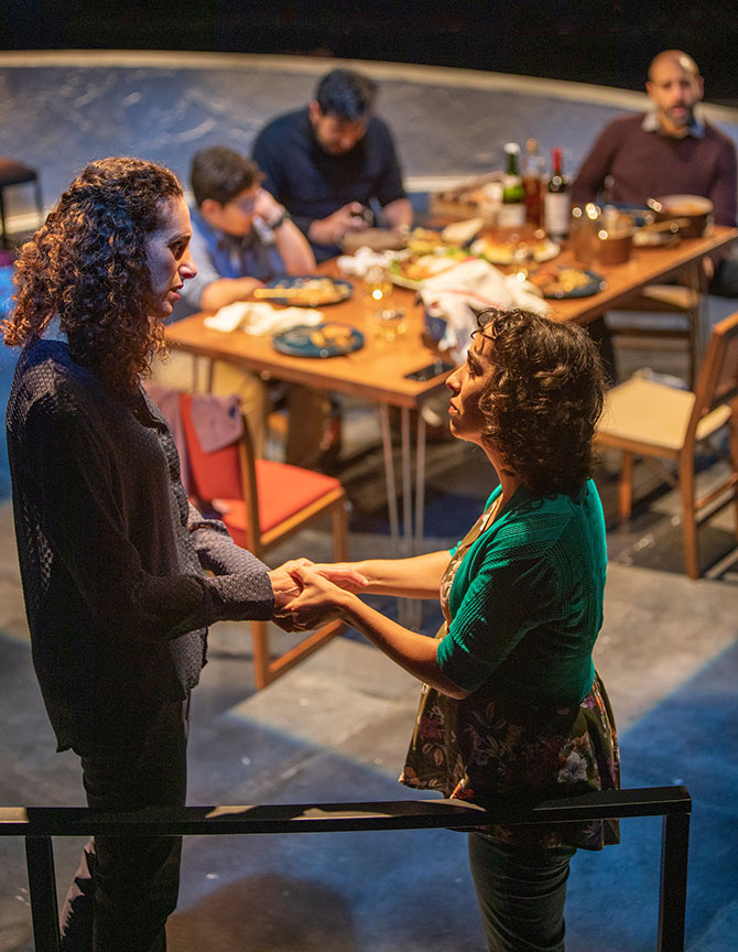 (foreground) Lameece Issaq as Noura/Nora and Isra Elsalihie as Maryam, with Giovanni Cozic as Yazen/Alex, Fajer Kaisi as Rafa'a, and Mattico David as Tareq/Tim. Noura, by Heather Raffo,  and directed by Johanna McKeon, runs September 20 – October 20, 2019 at The Old Globe. Photo by Jim Cox.