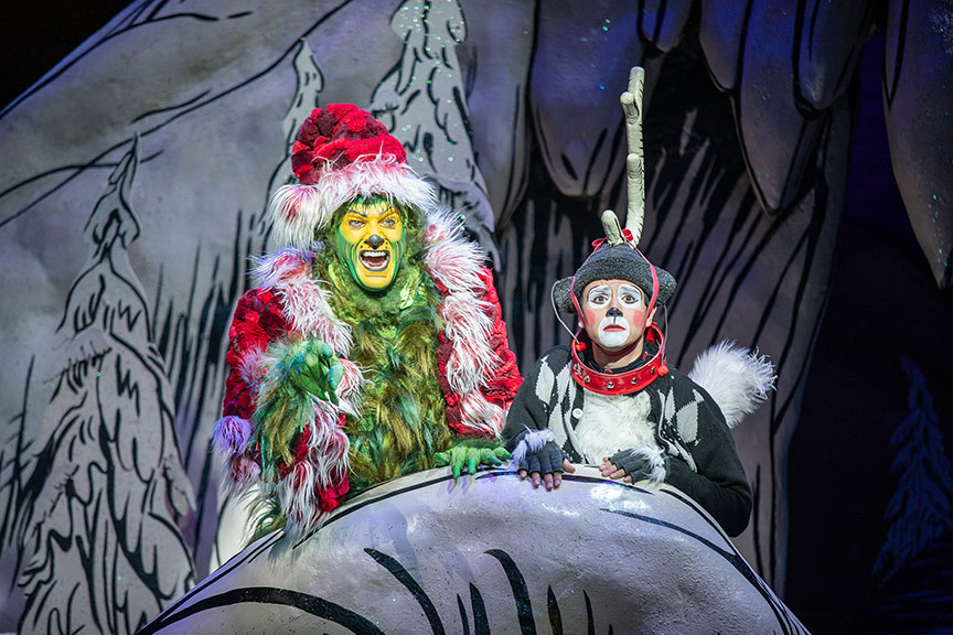 Edward Watts as The Grinch and Tommy Martinez as Young Max. Dr. Seuss's How the Grinch Stole Christmas!, book and lyrics by Timothy Mason, music by Mel Marvin, original production conceived and directed by Jack O'Brien, original choreography by John DeLuca, and directed by James Vásquez, running November 10 – December 29, 2019 at The Old Globe. Photo by Jim Cox.