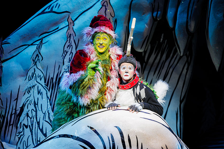 (from left) Andrew Polec as The Grinch and Tommy Martinez as Young Max  in Dr. Seuss's How the Grinch Stole Christmas!, 2024. Photo by Rich Soublet II.